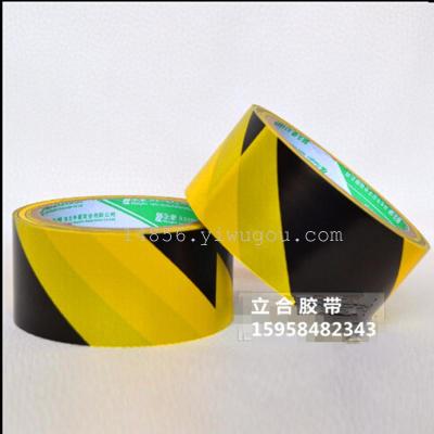 Yellow and black caution tape Zebra tape identifies the floor tape