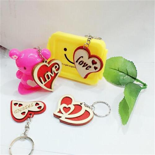 a variety of love wood keychain