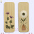 Large supply of tourist souvenirs real flowers flower bookmarks