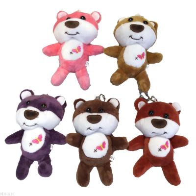 Stuffed bear, baby bear, baby doll, toy trumpet, baby doll.\