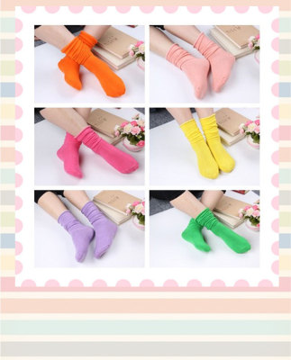 New piles of socks and winter high stockings explosions in Candy-colored cotton casual fashion, warm socks wholesale