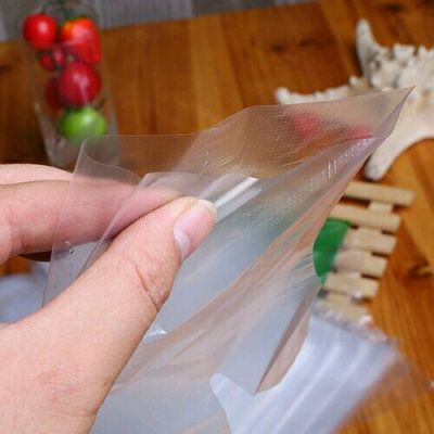 Manufacturer's direct selling disposable glove food and cooking cosmetic household plastic PE gloves 50 pieces.