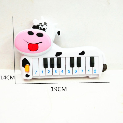 Children's puzzle toy bag children plastic cow 10 key electronic piano toys