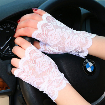 Summer female lace gloves new driving sun protection gloves anti-uv light short anti-slip thin ladies half finger gloves.