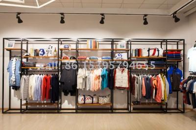Clothing stores display shelf - to - wall hangers