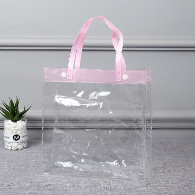 Manufacturers direct selling transparent PVC bag spot plastic gift bag printed PVC bag button plastic clothing bag