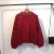 New autumn and winter round collared loose sweater women's short style pearl decorative knitted sweater