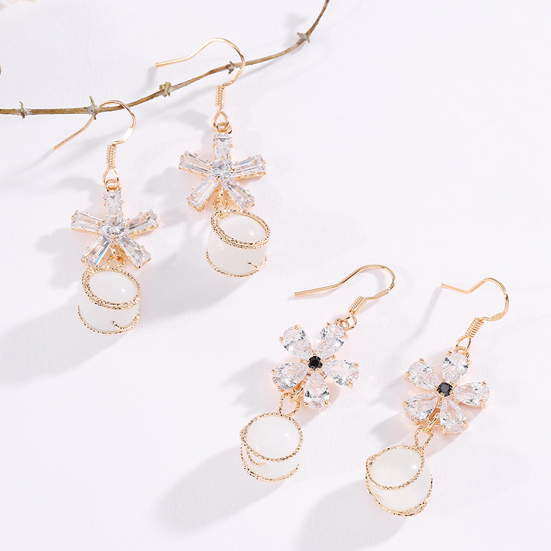 韩版花朵小领结猫眼花耳环珍珠长款耳坠气质百搭抖音耳环新耳饰品