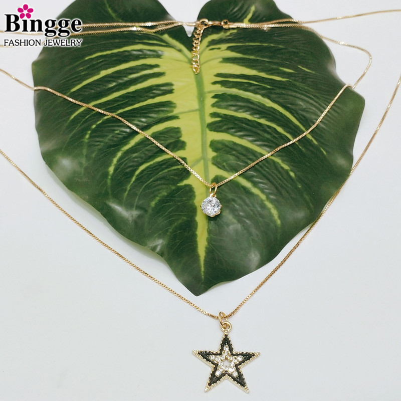 时尚新款欧美流行款毛衣链简约黑色滴油星星吊坠百搭女款厂家直销