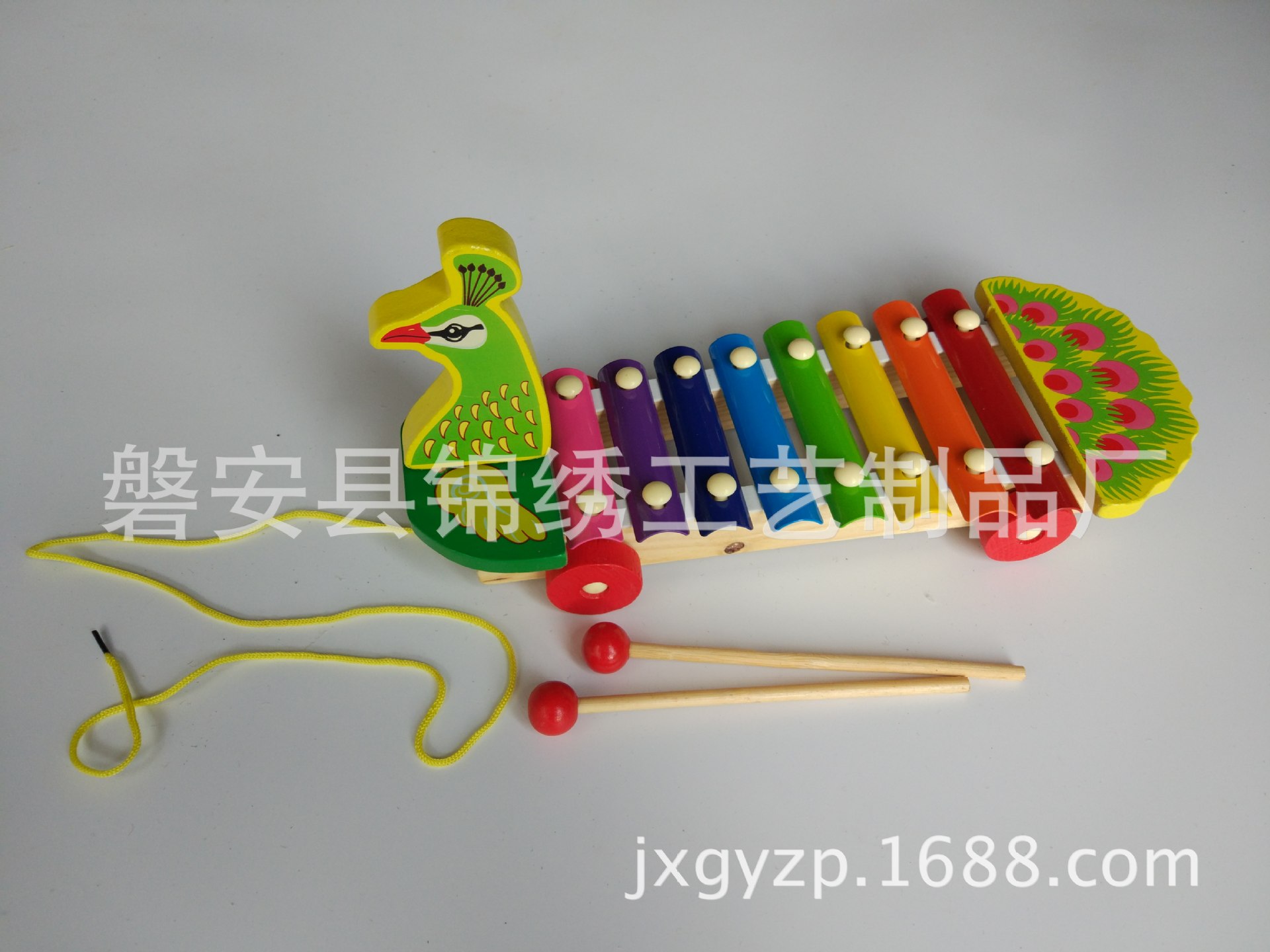 厂家直销 孔雀八音琴 儿童手拉敲琴 四轮八音琴 儿童早教乐器