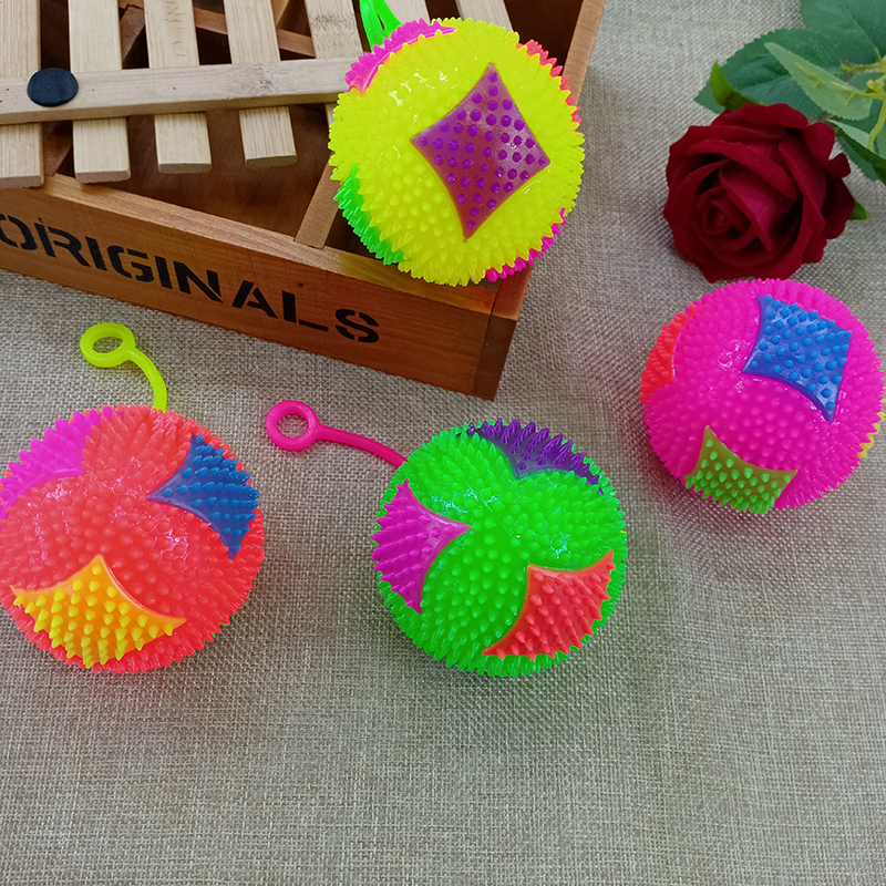 发光按摩球 7.5cm弹力球闪光风叶足球带绳带口哨刺球发光哨子球