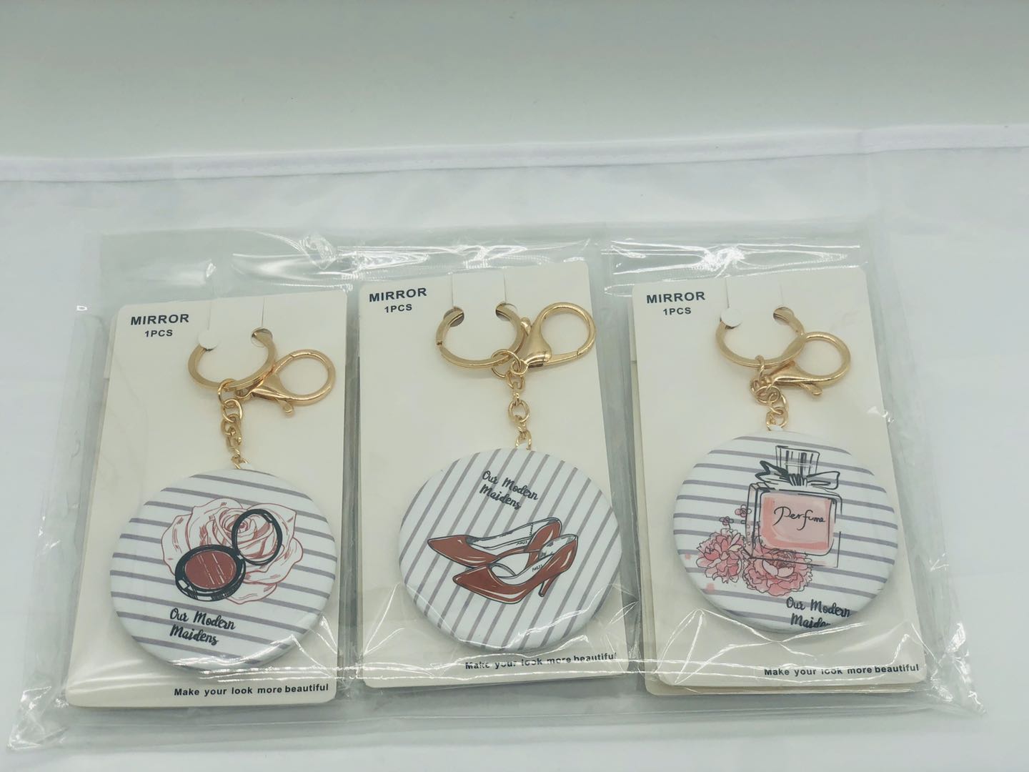 地摊经济 新式潮流爆款网红钥匙扣镜 便携塑料挂坠小镜