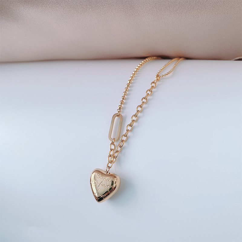 14K镀金爱心款钛钢项链不对称拼接链条桃心锁骨链女简约轻奢饰品