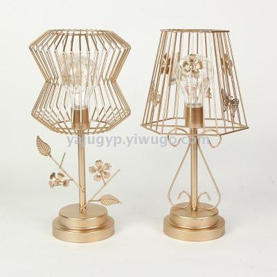 Wrought iron candlestick furnishing piece creative hollow-out windproof lamp retro European scented candle table furnishing piece metal