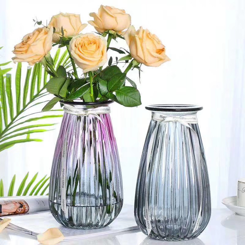 Small transparent glass vase for flowers on a leg with a corrugated top Vase small bouquet flowers dried flowers berries decor desktop bowls