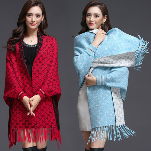 autumn and winter warm jacquard geometric cloak women‘s long-sleeved knitted outer tower cheongsam cloak spring cross-border tassel double-sided shawl