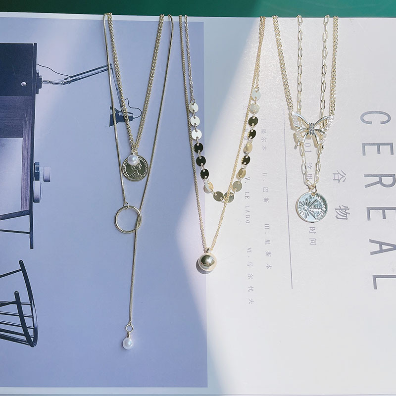 多层项链蝴蝶金属球人面冷淡风简约设计毛衣链锁骨链珍珠冷淡风酷