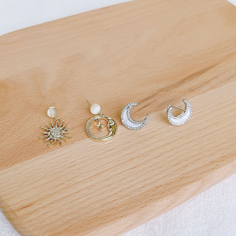 时尚太阳月亮简约耳环日韩设计猫眼日夜不对称锆石日常银针女网红