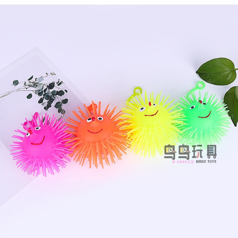 工厂批发新款毛毛球弹力发泄球 挤压笑脸发光多色刺猬球捏捏乐
