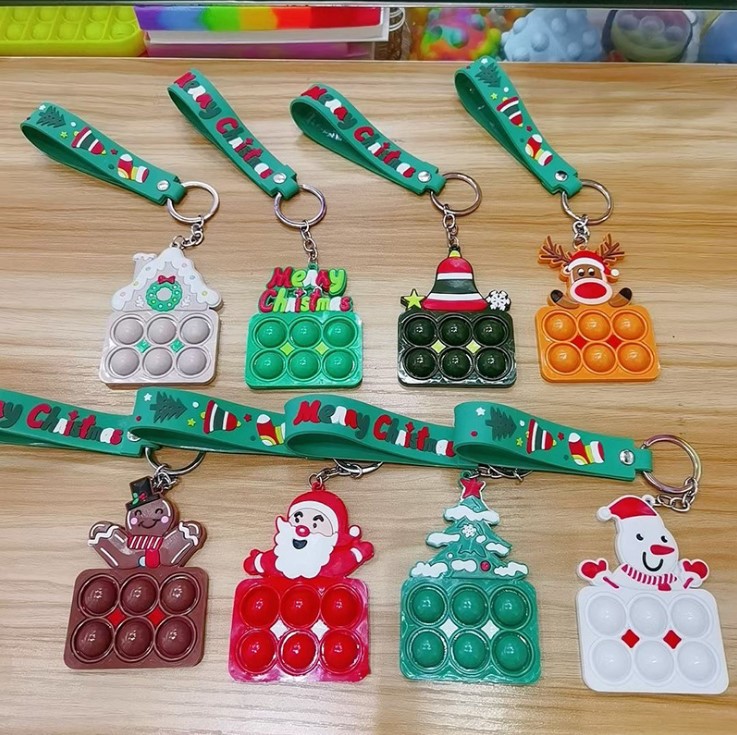 跨境爆款灭鼠先锋钥匙扣圣诞挂件圣诞老人泡泡乐雪人铃铛工厂直销