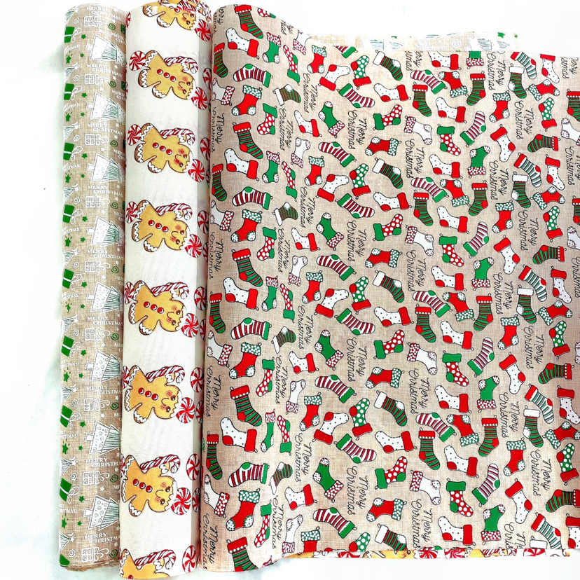 新款圣诞花型面料 烫金布 箱包礼品包装面料批发印花棉麻布