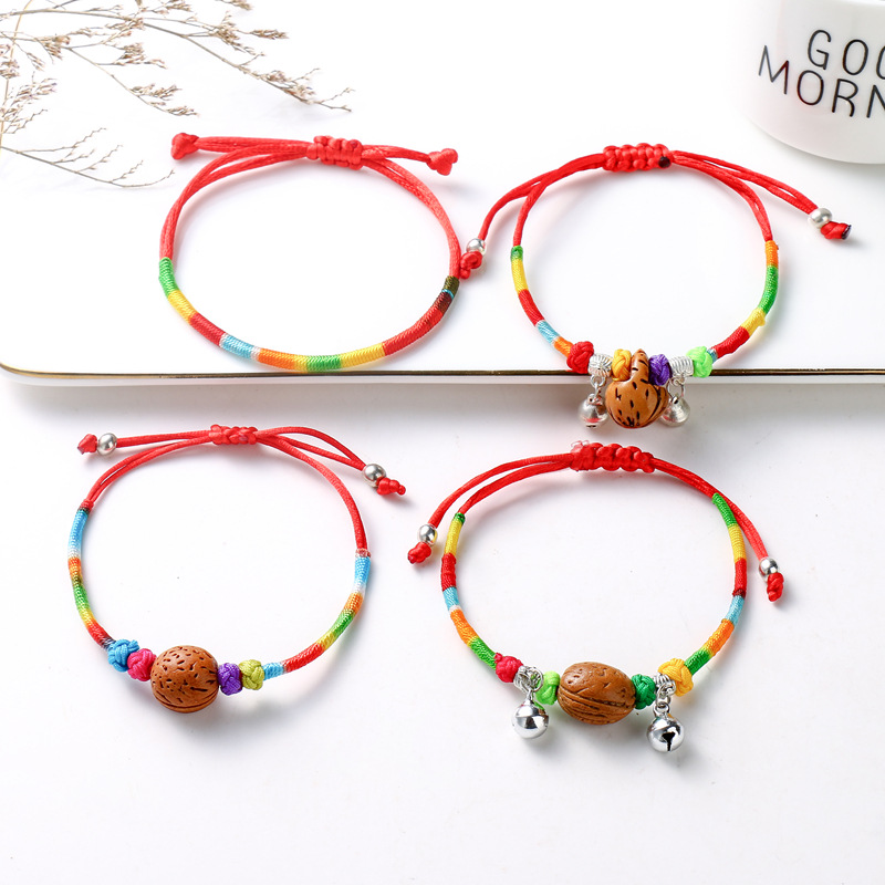 端午节热销五彩绳桃蓝桃核手链手工编织男女五月节绕线红绳手链