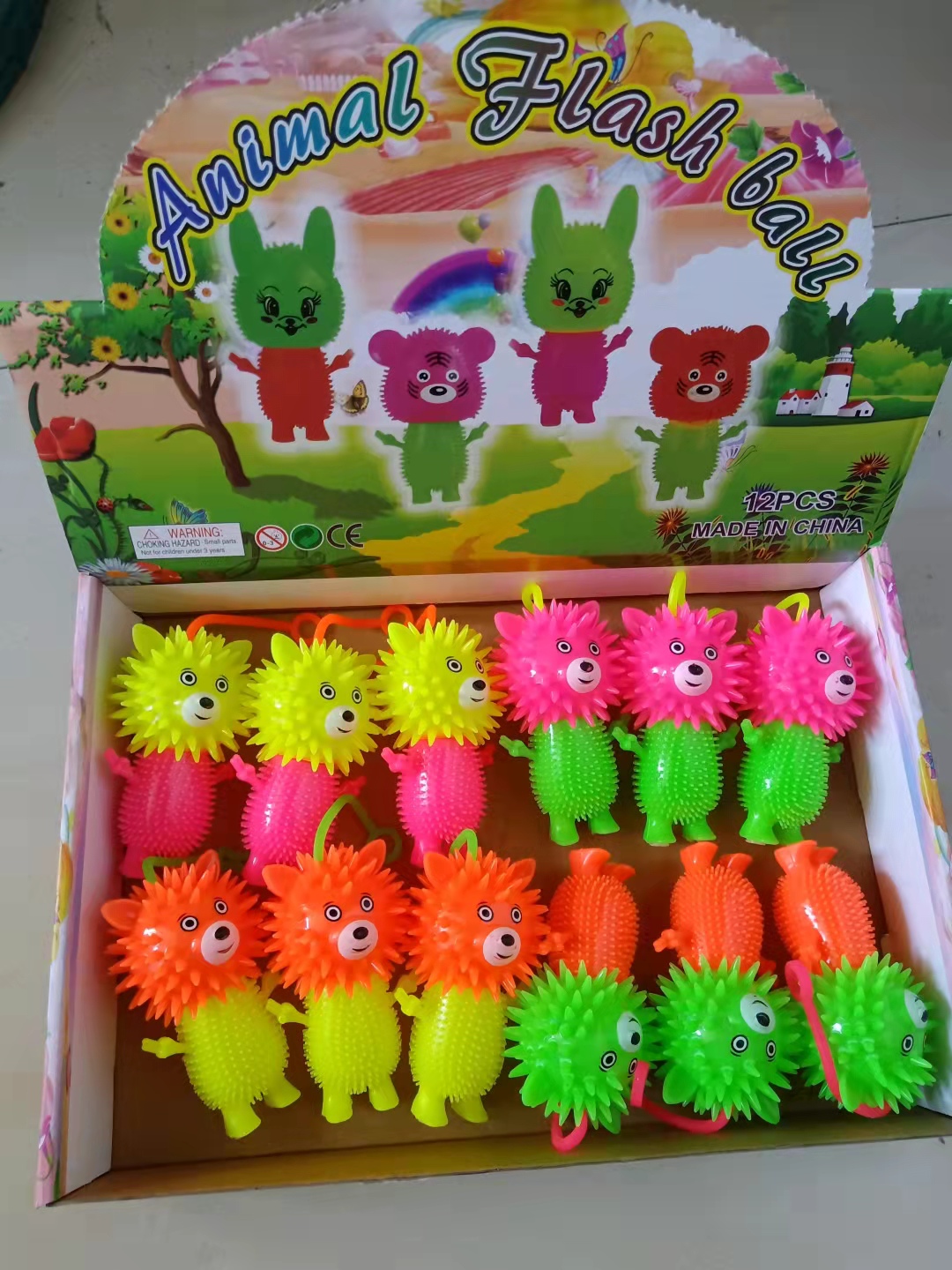 TPR软胶搪胶玩具闪光带哨叫叫球长裙皮卡丘口哨球毛毛球减压刺球