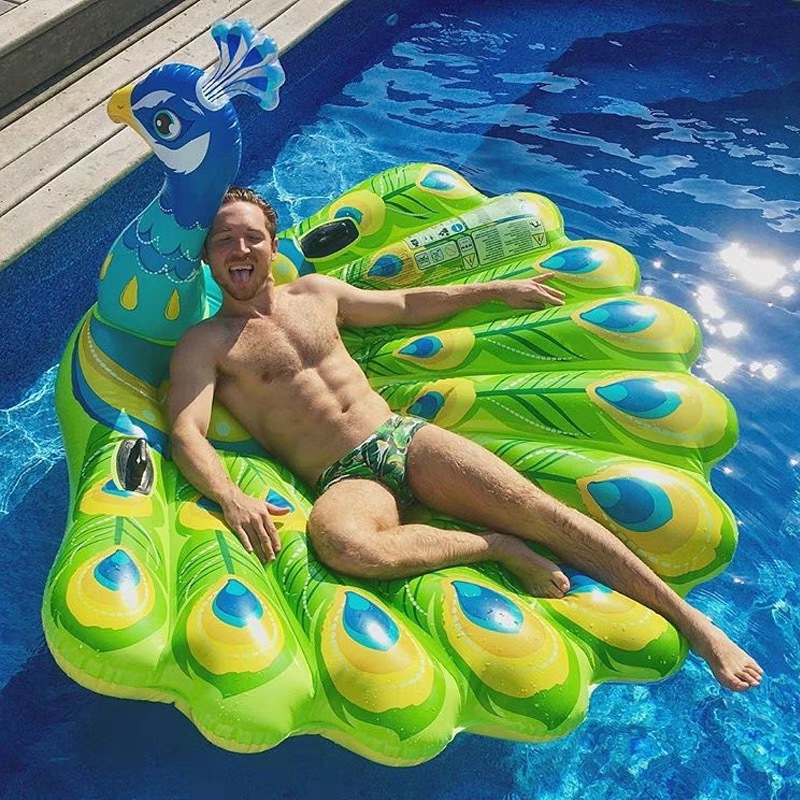 热销爆款 孔雀PVC充气水上坐骑浮排时尚游泳圈水上戏水儿童玩具