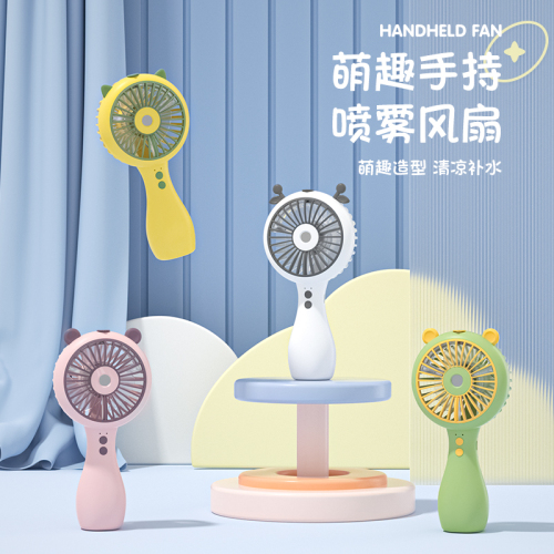 2022 new cute handheld spray fan usb charging water replenishing instrument portable fan summer internet celebrity fan