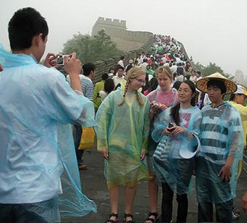 travel standing disposable one-piece raincoat four-button poncho portable pe pullover raincoat unisex