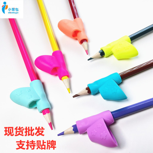 cross-border wholesale primary school student pen holder children stationery silicone writing posture corrector correction pencil case