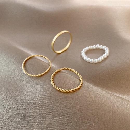 Ins Cold Wind Combination Ring Four-Piece Set Pearl Plain Ring Stacked Joint Ring Female Matte Gold Advanced Sense Ring Tide