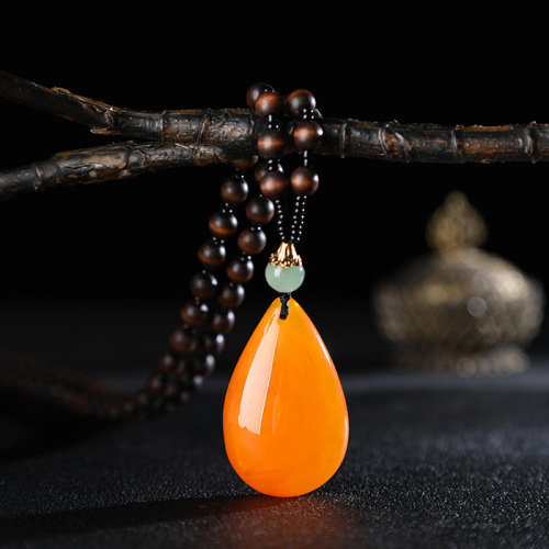 Yiwu Accessories Wholesale Ethnic Style Imitation Beeswax Water Drop Necklace Core Wooden Bead Long Sweater Chain Women‘s Imitation Amber Pendant