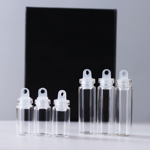 Factory Wholesale 1.5ml Transparent Glass Mini Bottle Plastic Stopper Nail Art Container with Hole Pendant Ornaments Accessories