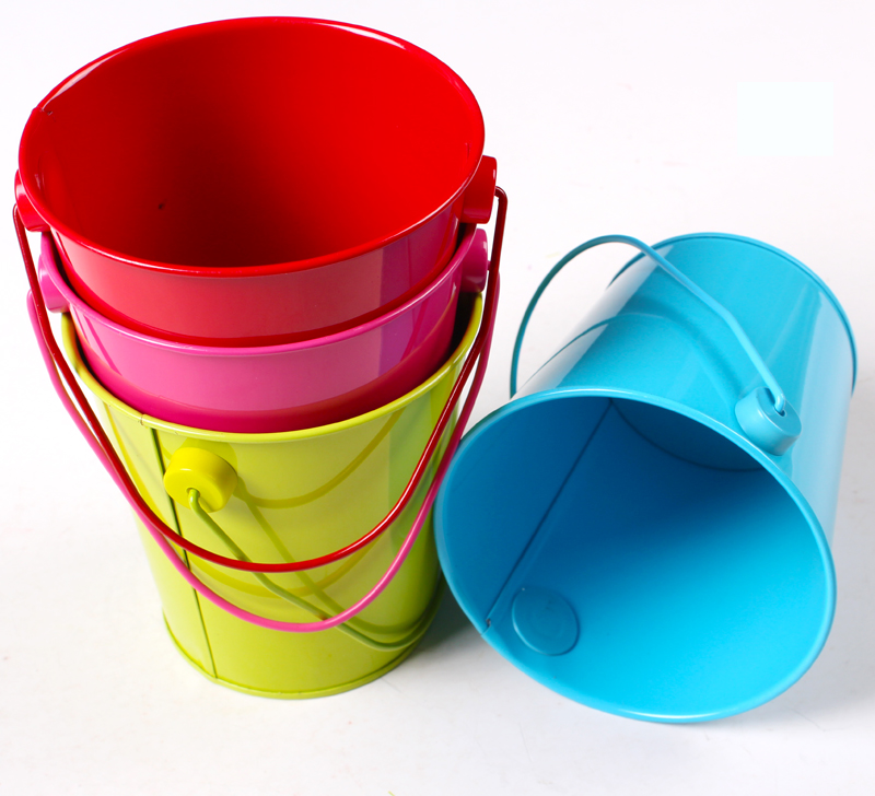 small coloured plastic buckets