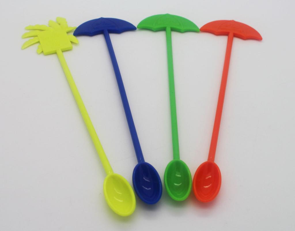 A long plastic mixing spoon with A small umbrella - shaped paddle and A colorful ice spoon for stirr
