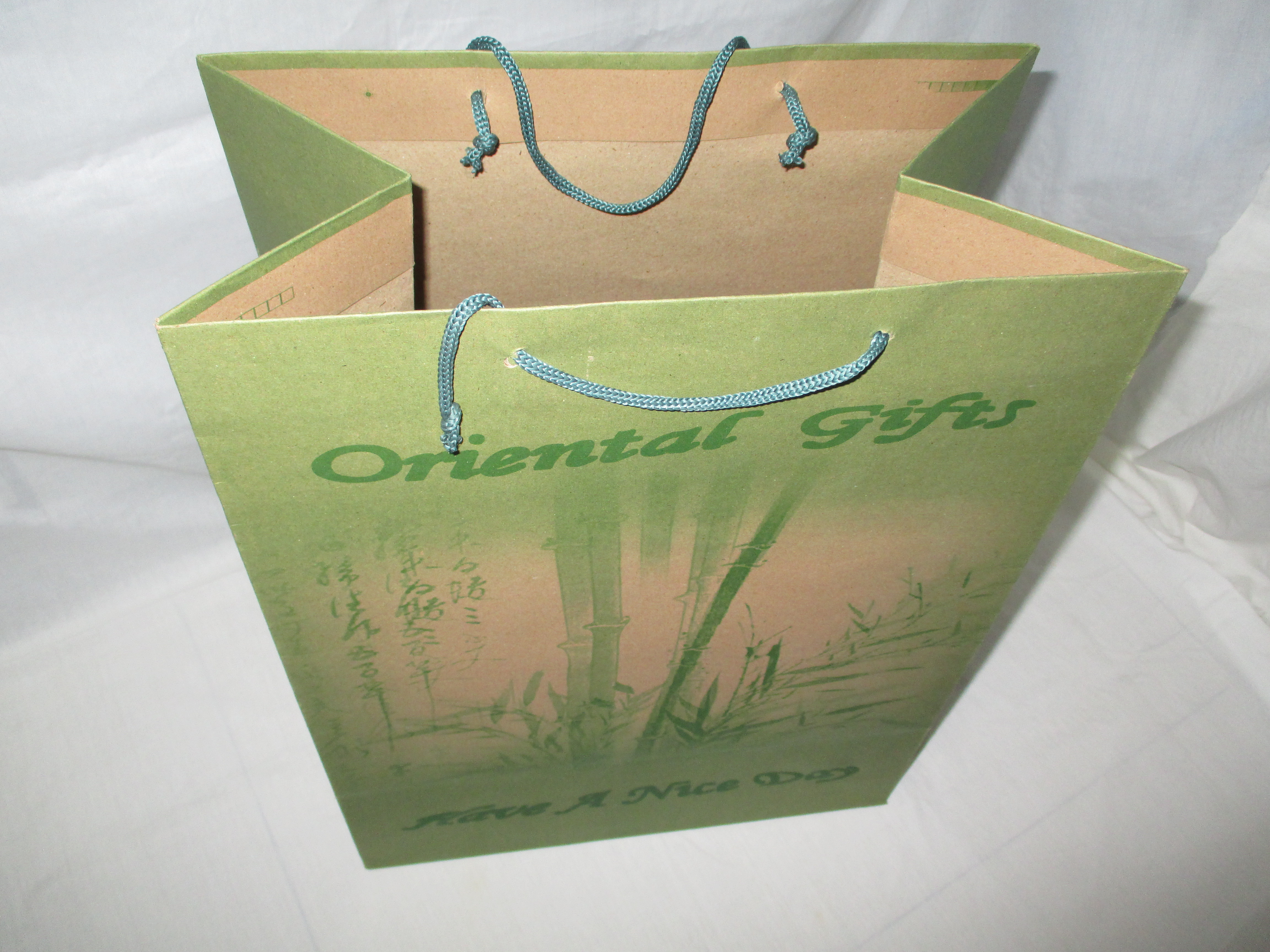 纸袋环保礼品袋 购物袋 服装袋 饰品袋 牛皮手提袋_展翔制袋_义乌国际