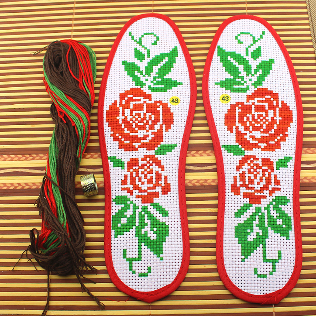 cross stitch embroidered shoe pad to celebrate the festival.