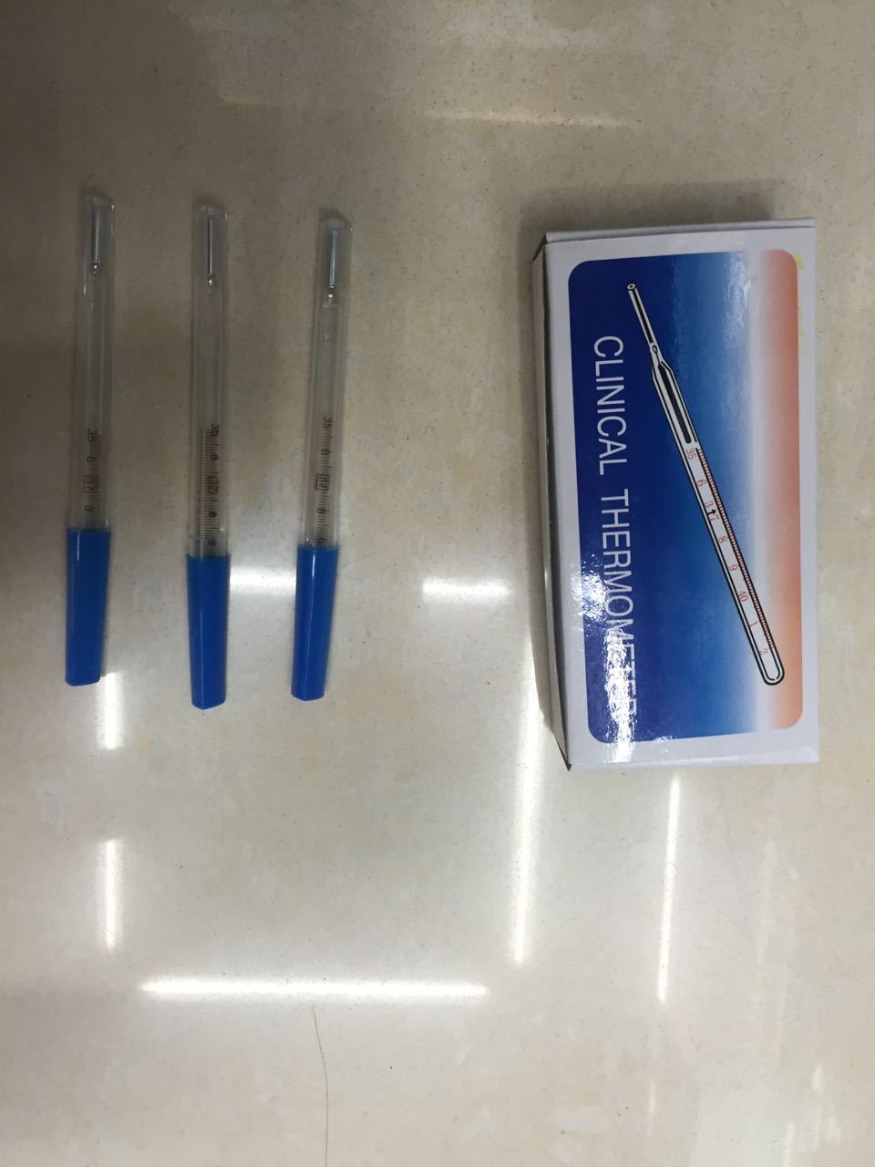 Small mercury thermometers.