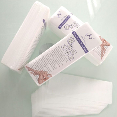 Non-woven paper strips for waxing