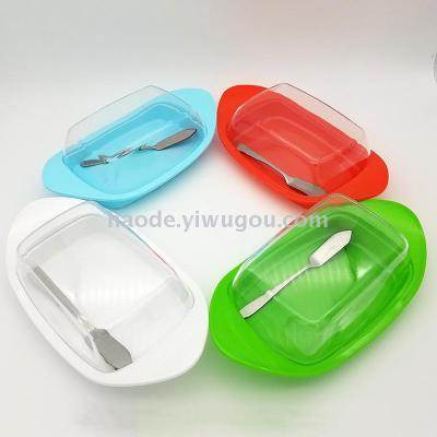 Boat-shaped plastic butter dish with transparent cover and colorful cheese box
