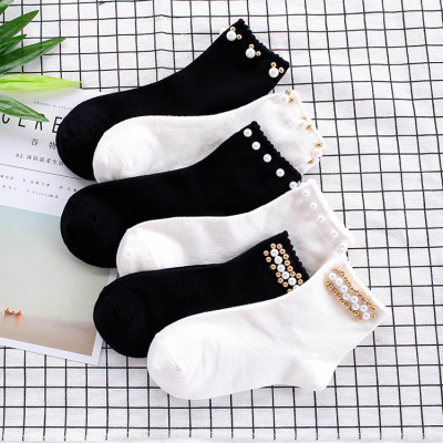 Autumn and winter new cotton socks pure color pearl socks female Japanese Korean fashion socks manufacturers socks.