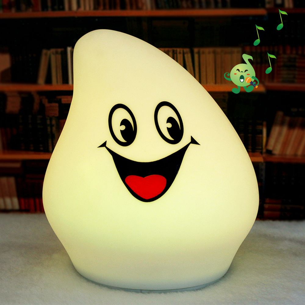 音乐七彩发光硅胶灯 可爱芒果型音乐发光拍拍小夜灯
