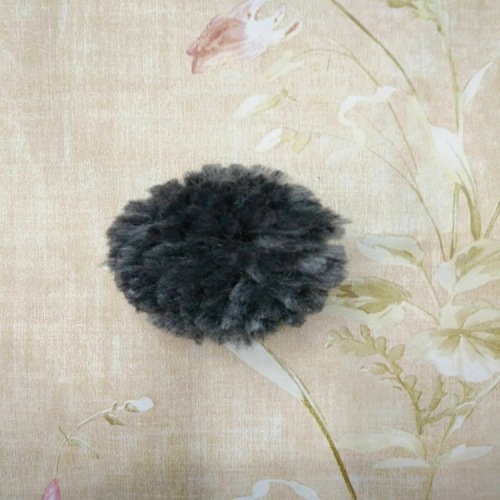 specializing in the production of customized ice island wool line cashmere wool strip hair ball wholesale