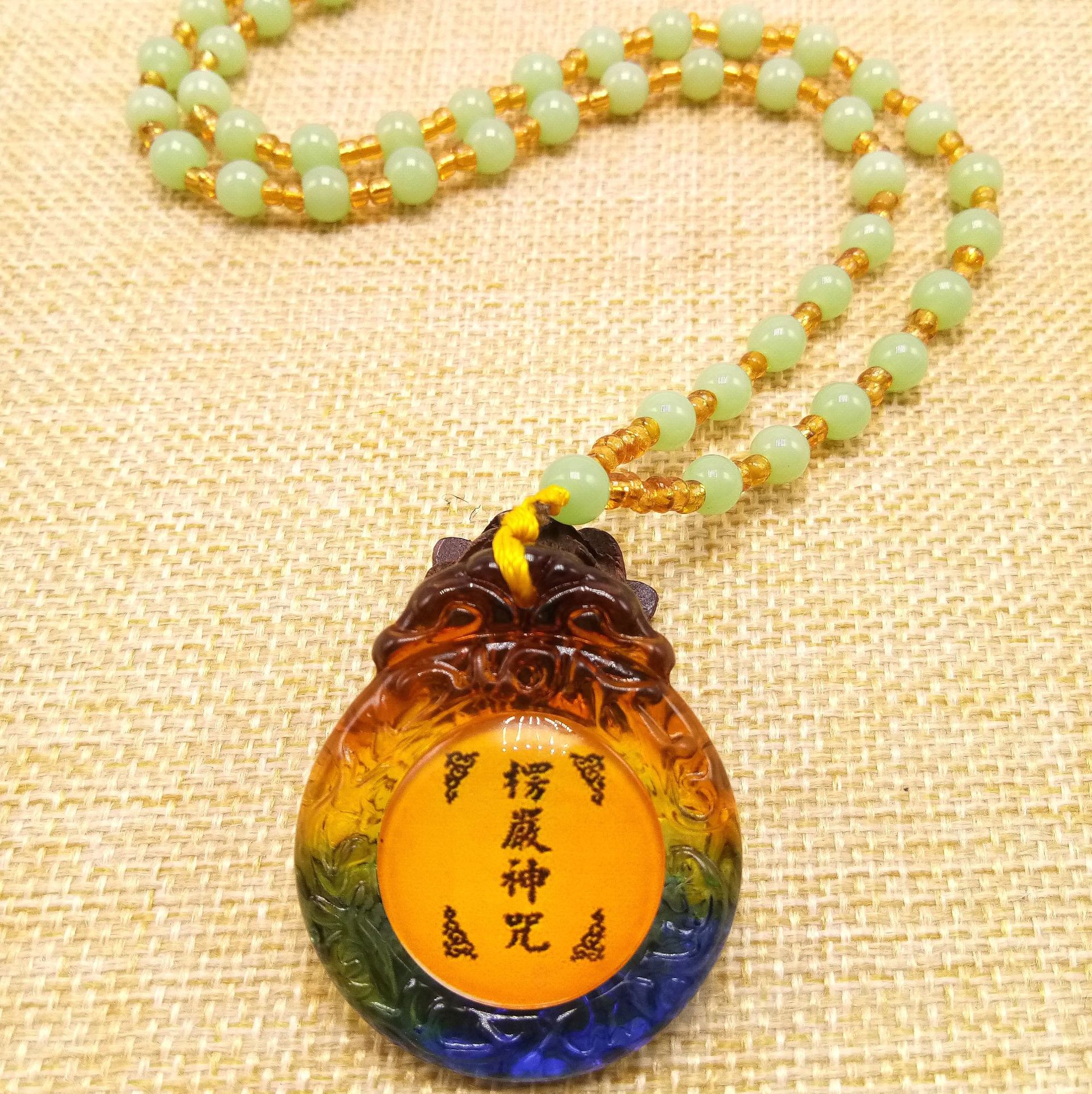 新款仿琉璃楞严咒项链男女通用楞严咒挂件毛衣链结缘品
