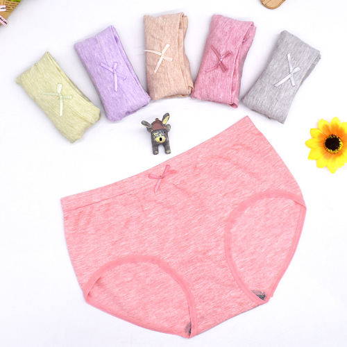 Women‘s Underwear New Seamless Colored Mesh Bare Ammonia Low Waist Seamless High Elastic Cotton Color Women‘s Briefs Wholesale