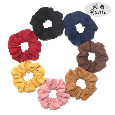 Cross - border Europe and the United States solid color large intestine dovetail ring qiu dong new style cloth art elastic hair ornaments lady chicken feather hair ring wholesale