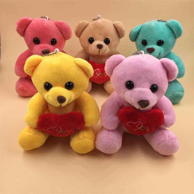 Paula 4 inches holding the heart to sit on the small plush b...