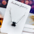 Niche design fashion black and white ceramic hot style small red book extraction Roman numeral clavicle necklace pendant star