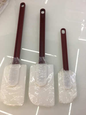 Large scraper with long handle for silicone cake